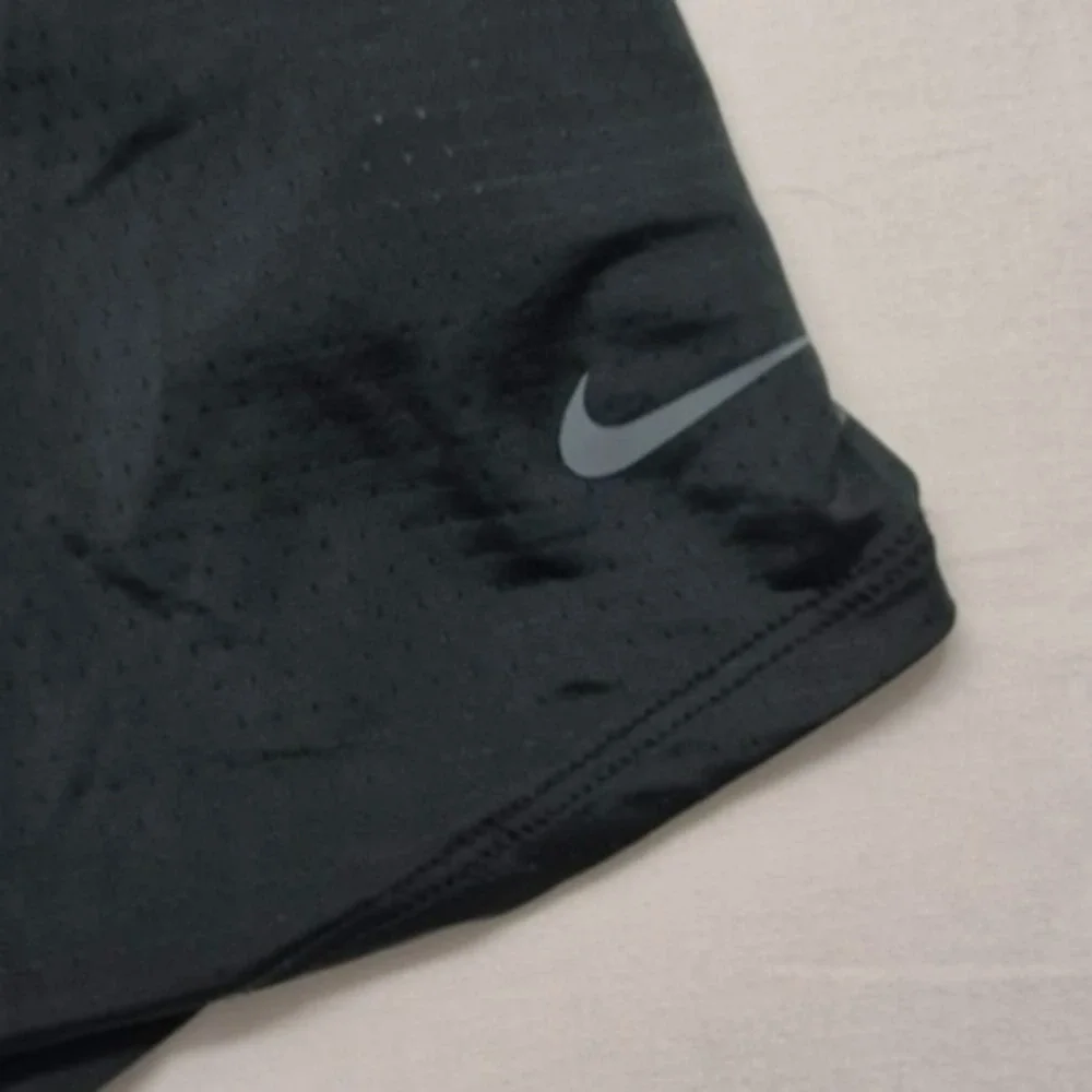 Nike women's green exercise racing back top 
